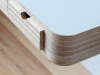 The CNC machine can cut smooth curves to show the different layers
